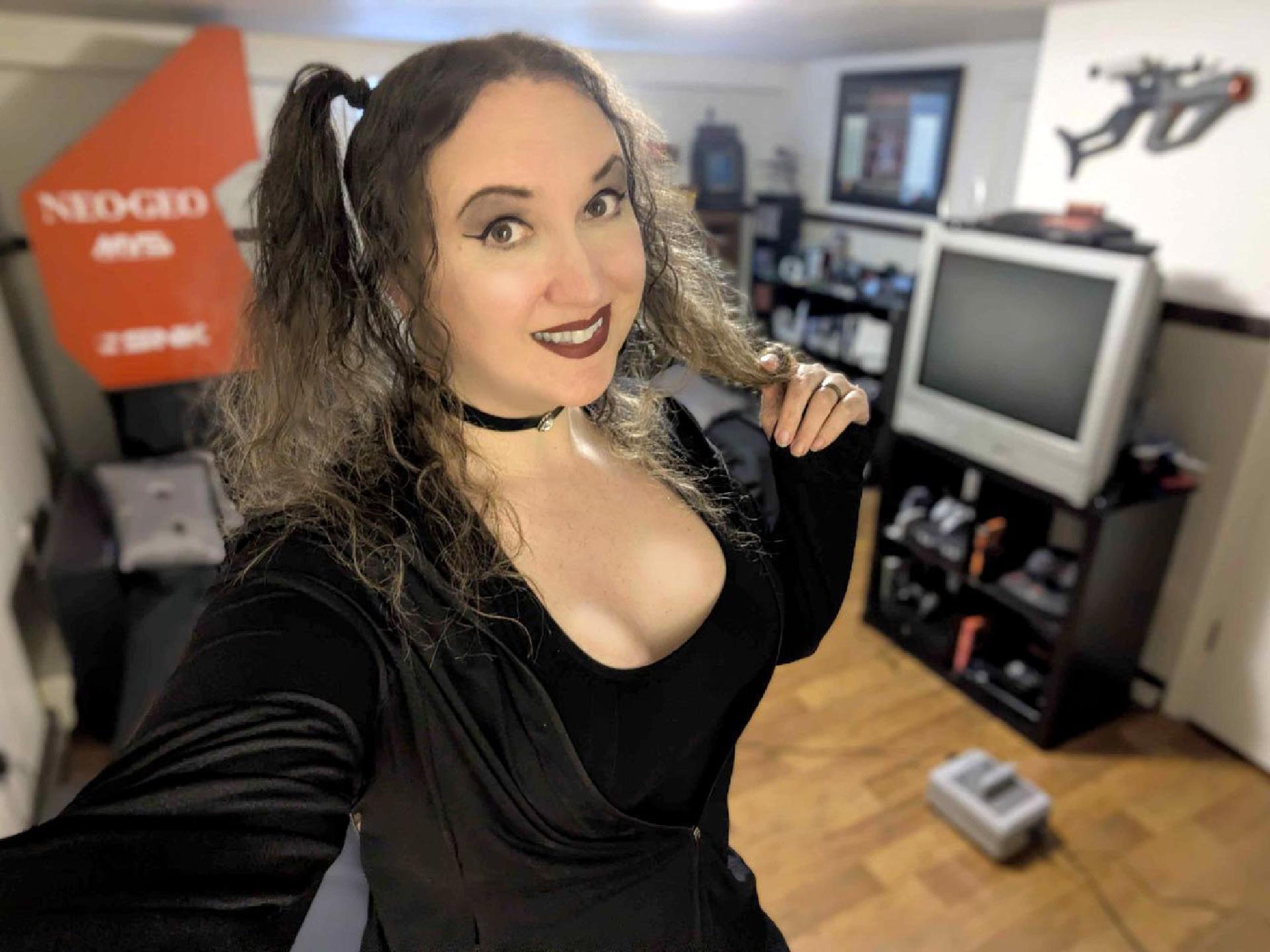 Selfie at the door of my games room - visible in background is my Neo Geo MVS, Super Famicom, Sega Menacer and CRT