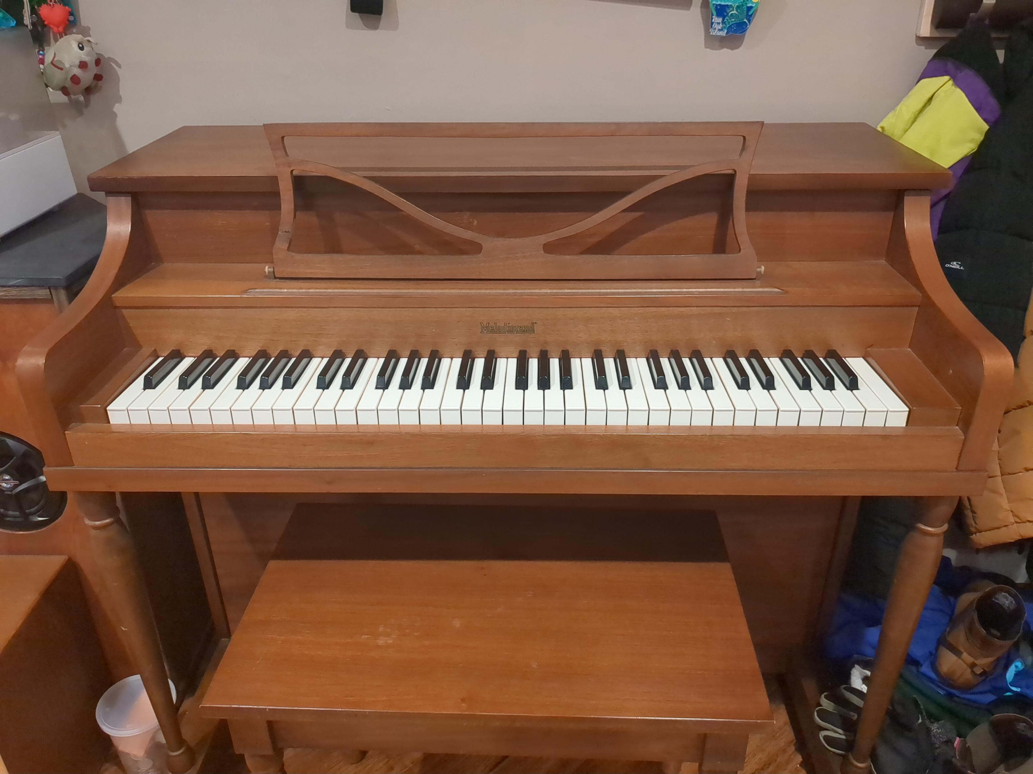 a 64-key Melodigrand piano
