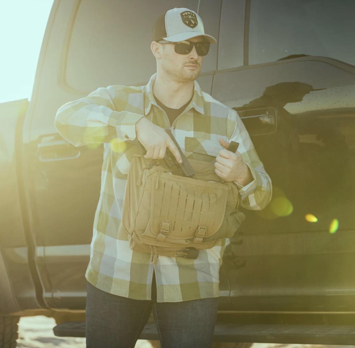 Advertisement for a “tactical bag” oath some tiny Chad pulling a handgun out of his MAN BAG.