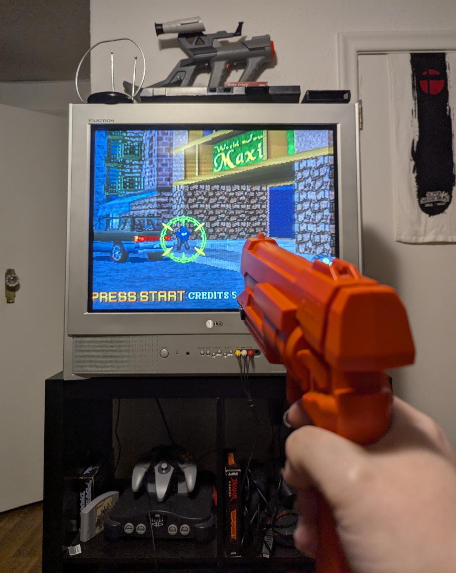 My Saturn Light gun aimed at a baddie in Virtua Cop 2 for my Saturn, being played on a CRT