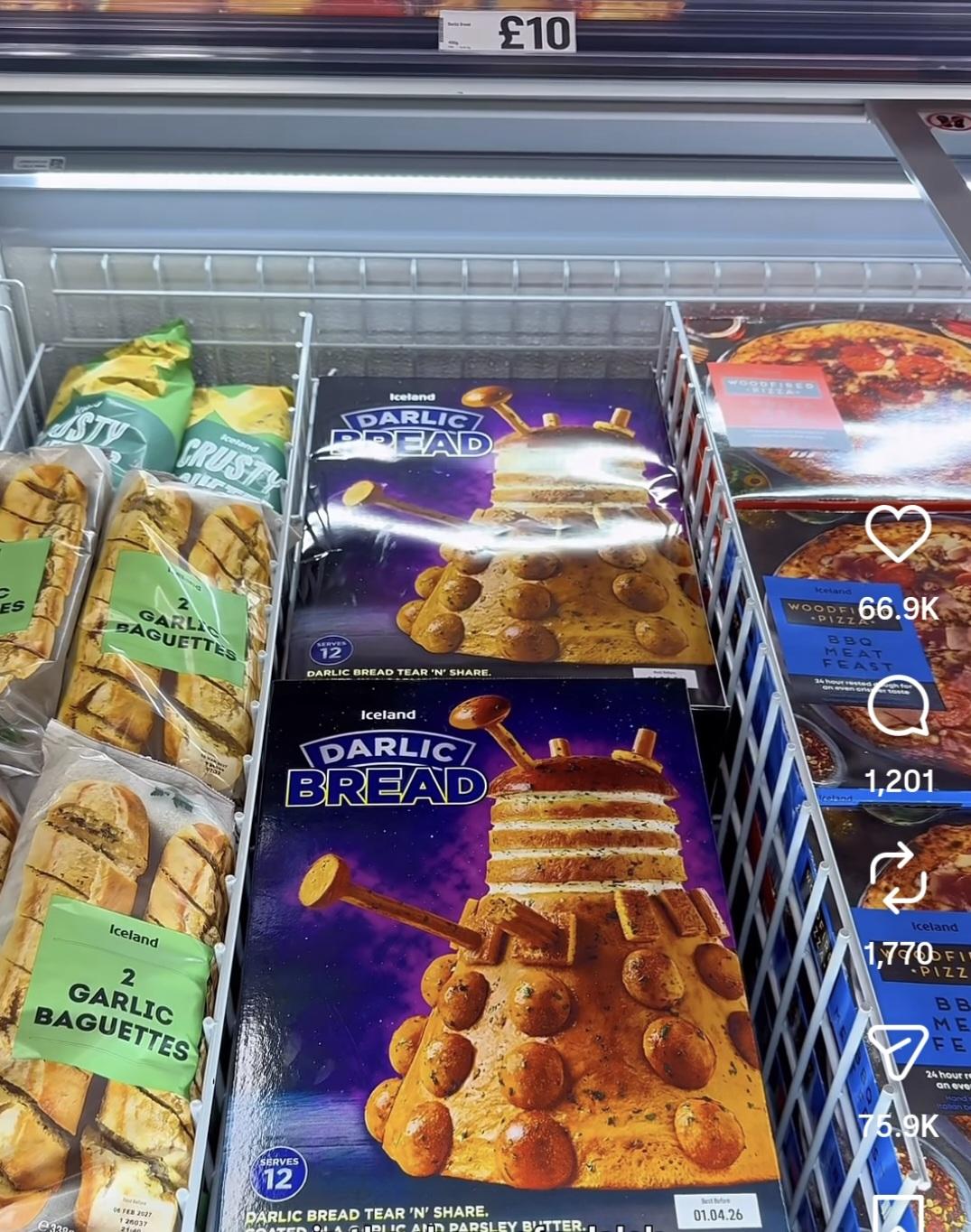 Supermarket frozen section shows garlic bread tear and share called Iceland Darlic Bread (serves 12). They are beside garlic baguettes and frozen pizza.