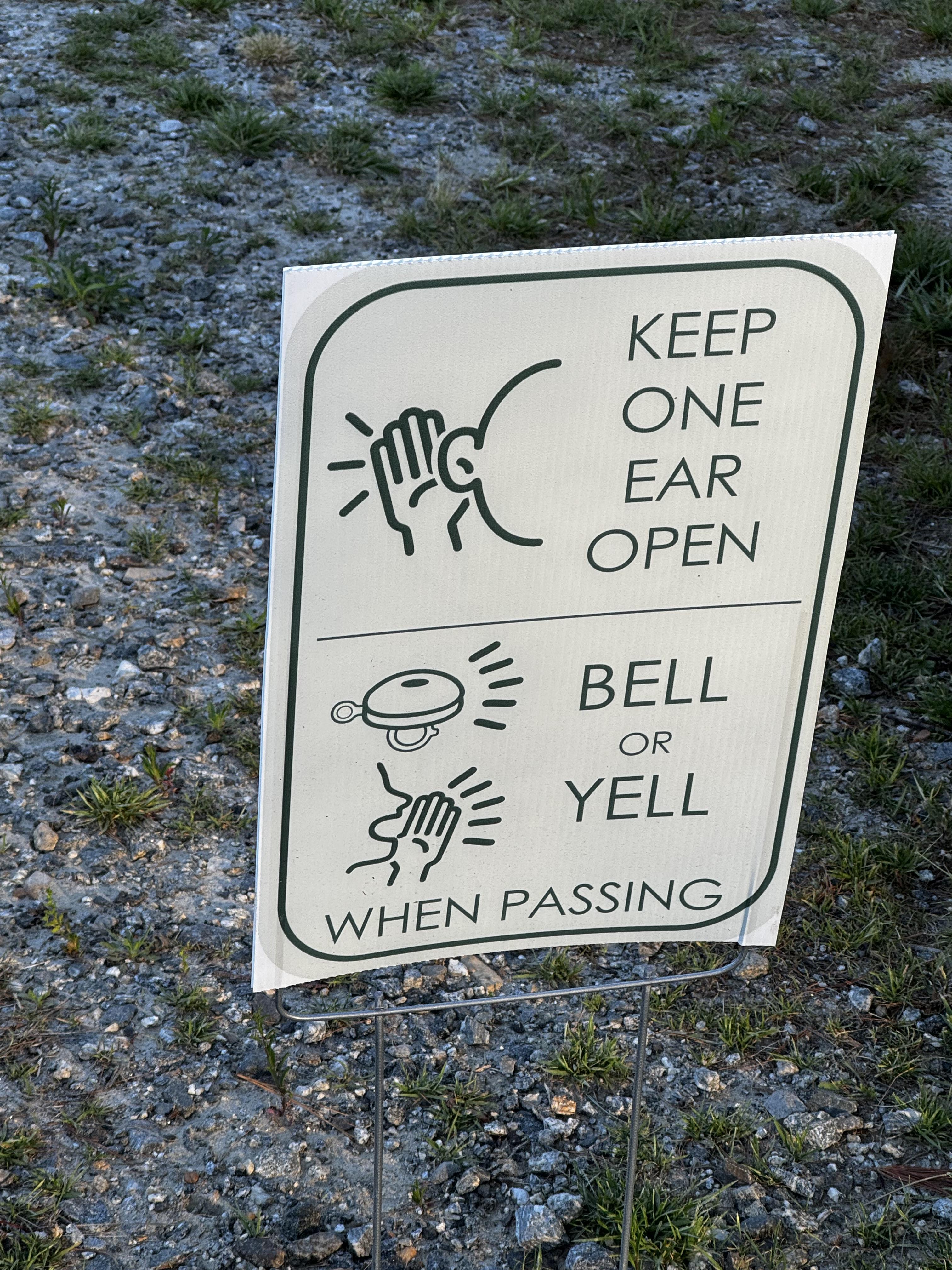 A useful sign has been placed next to the trail, but not a soul heeded it.  Why is it so freaking difficult for people to announce their presence, especially (sorry) the cyclists?  

The sign says "Keep one ear open" and then "Bell or Yell when passing"