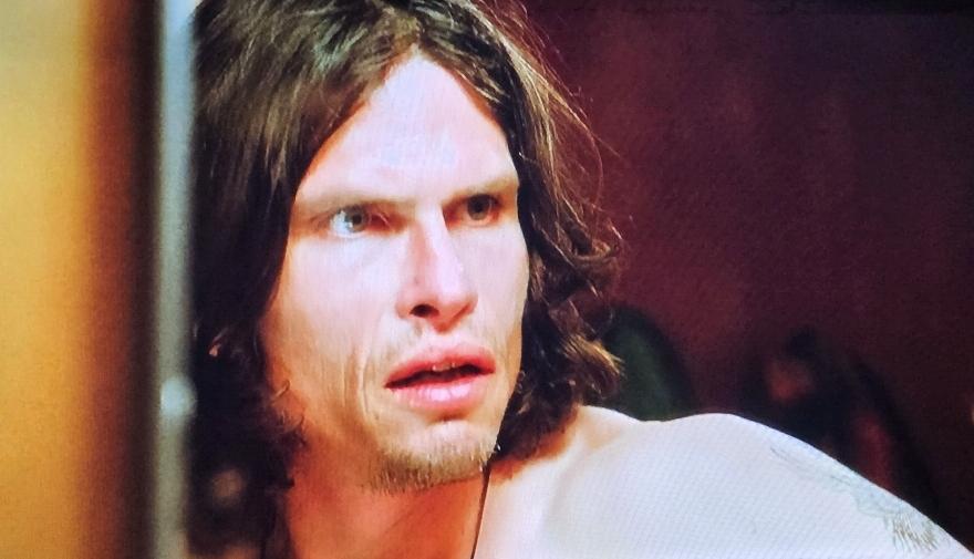 Jeff Kober head shot shirtless. He's looking in the mirror.