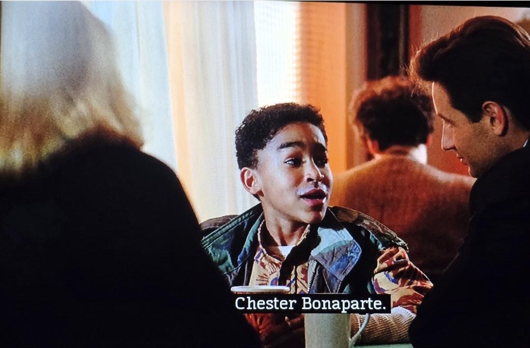 Jamil Walker Smith as Chester Bonaparte on X-Files. He's adorably little. Maybe 8 years old. He's told Scully and Mulder his name, "Chester Bonaparte" and has a milk mustache. So squeeeee!