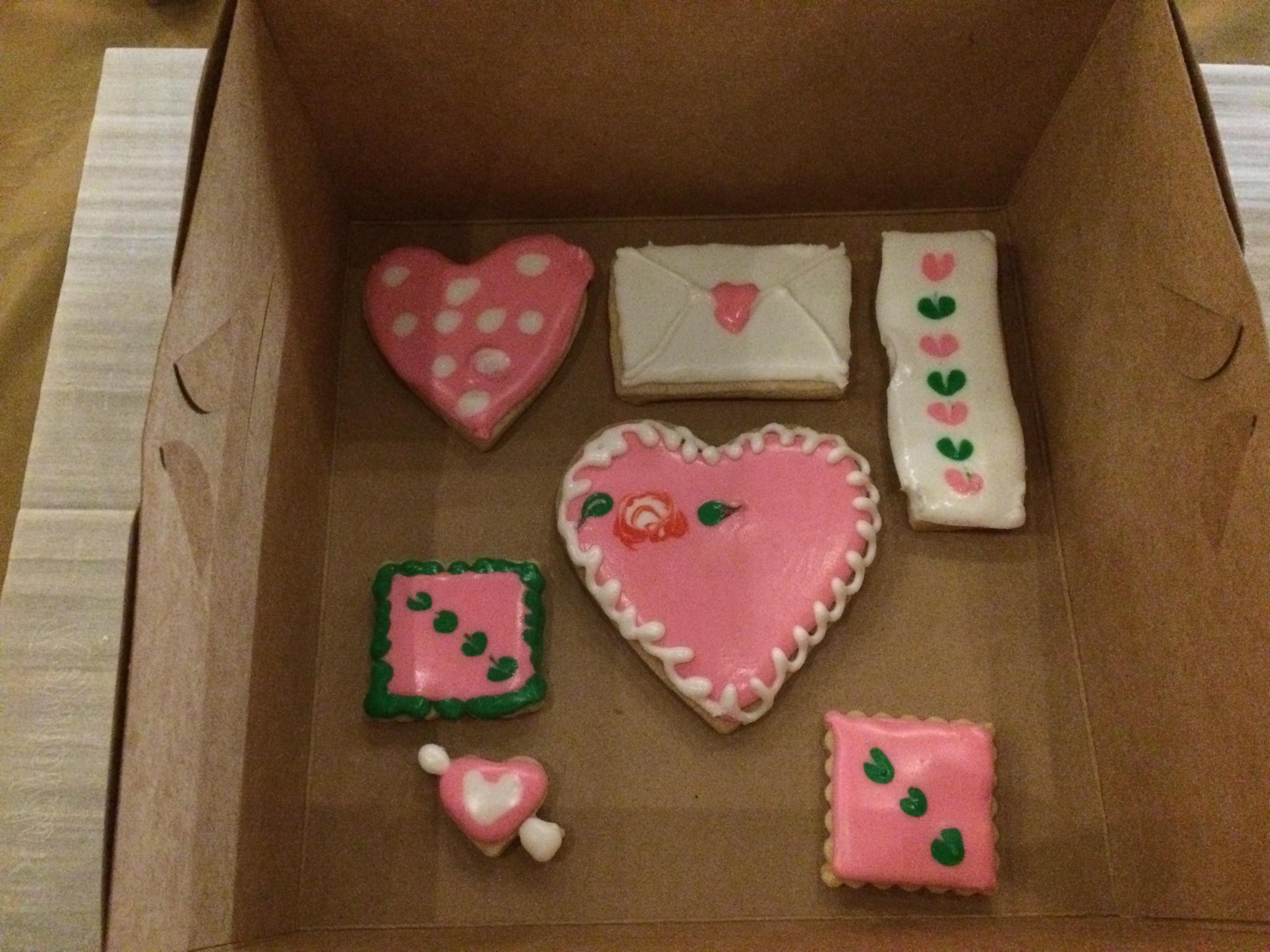 A box of 7 decorated sugar cookies, with pink, red and white icing, many either heart-shaped or decorated with hearts.  The baker was lovely, having all the materials there, and demonstrating how to make each design.  And being Asheville, there was also beer.

This was prior to covid, and we haven't done it more than those first 2 times.  I'm sure she still holds the events.