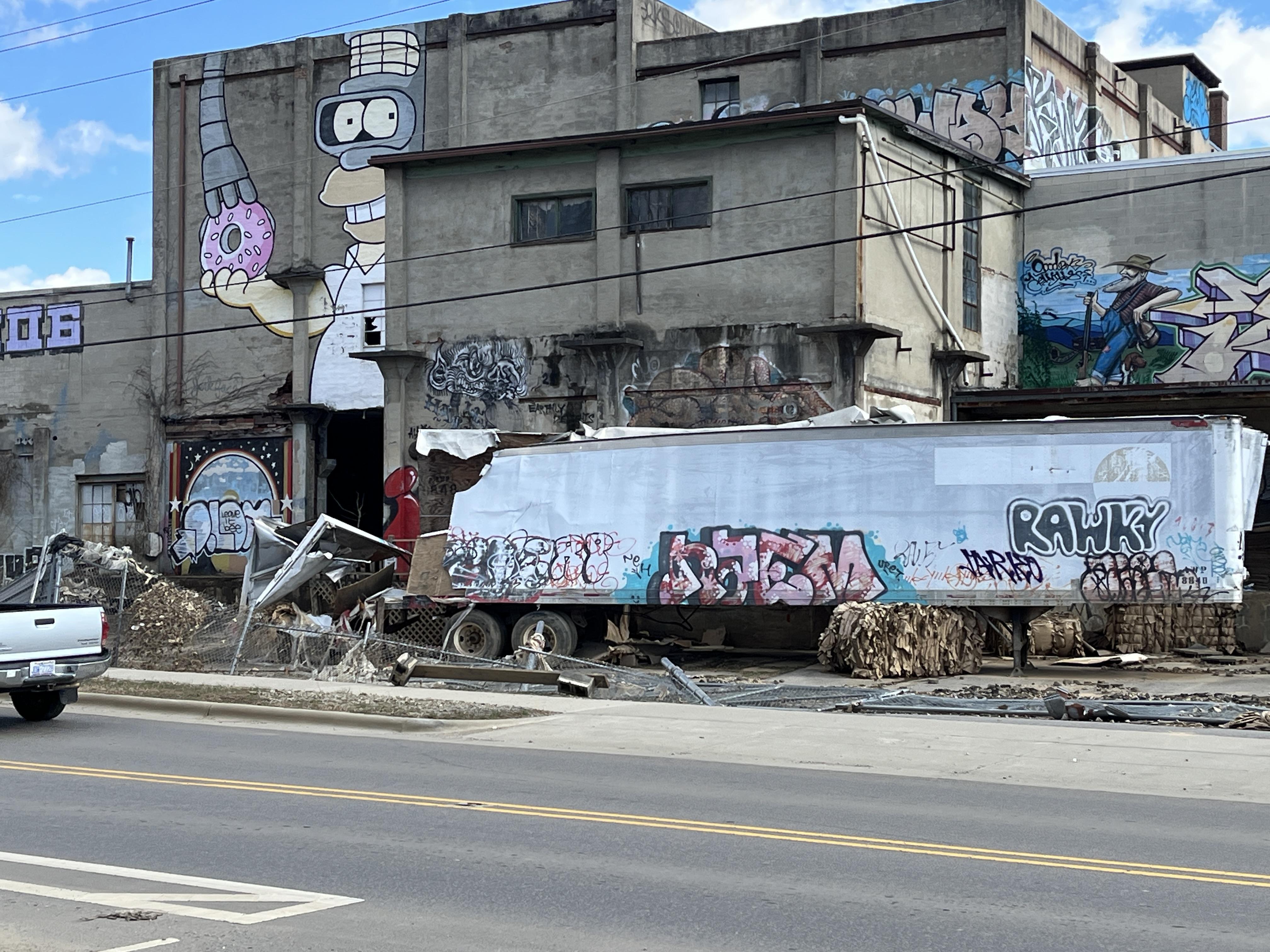 This large concrete building had been abandoned, but apparently still full of paper.  The photo is from December 2024, just months after Helene, and before some of the external debris was removed.

I surely hope no one was inside when this fire started.