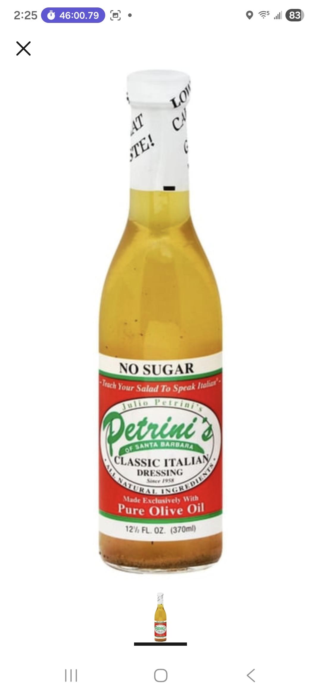 Red green white bottle of Italian dressing. Label reads: 
No sugar
Teach your salad to speak Italian
Julio Petrini's of Santa Barbara classic Italian dressing since 1958
Made exclusively with pure olive oil
12.5 FL oz. (370 ml)