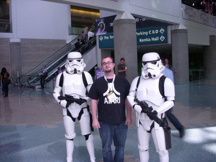 Me wearing an Atari shirt and two Storm Troopers